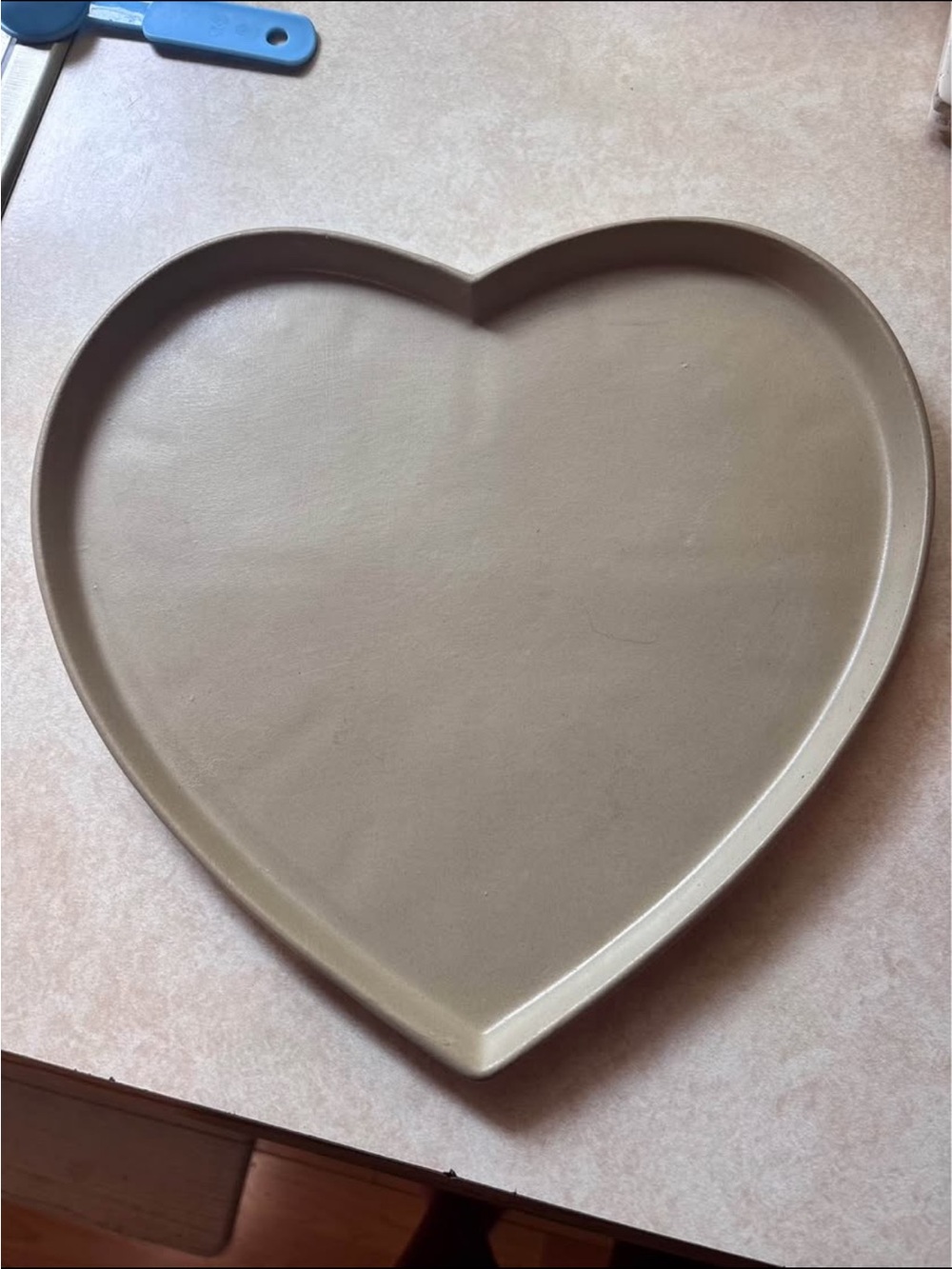 The Pampered Chef Heart cooking stone in Taupe Beige